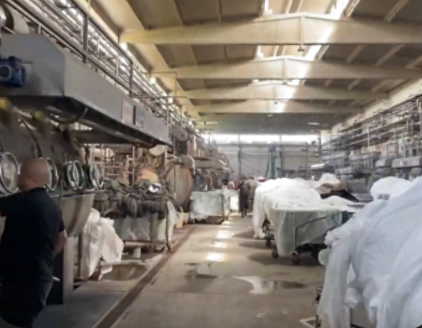 Dyeing machines lining the V.H Dyeing production floor in Ludhiana